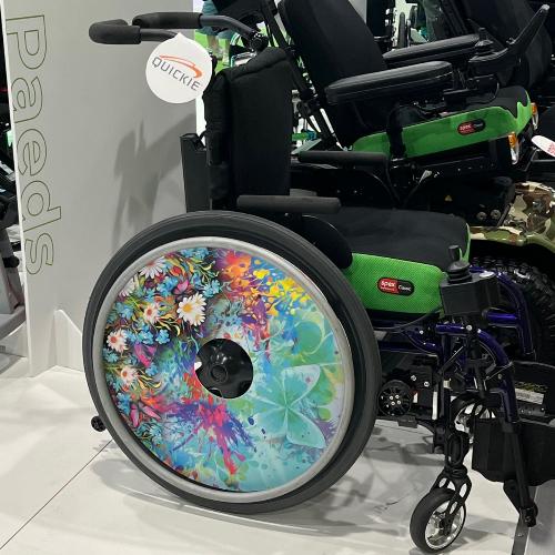 Butterfly Garden wheel covers on display at expo